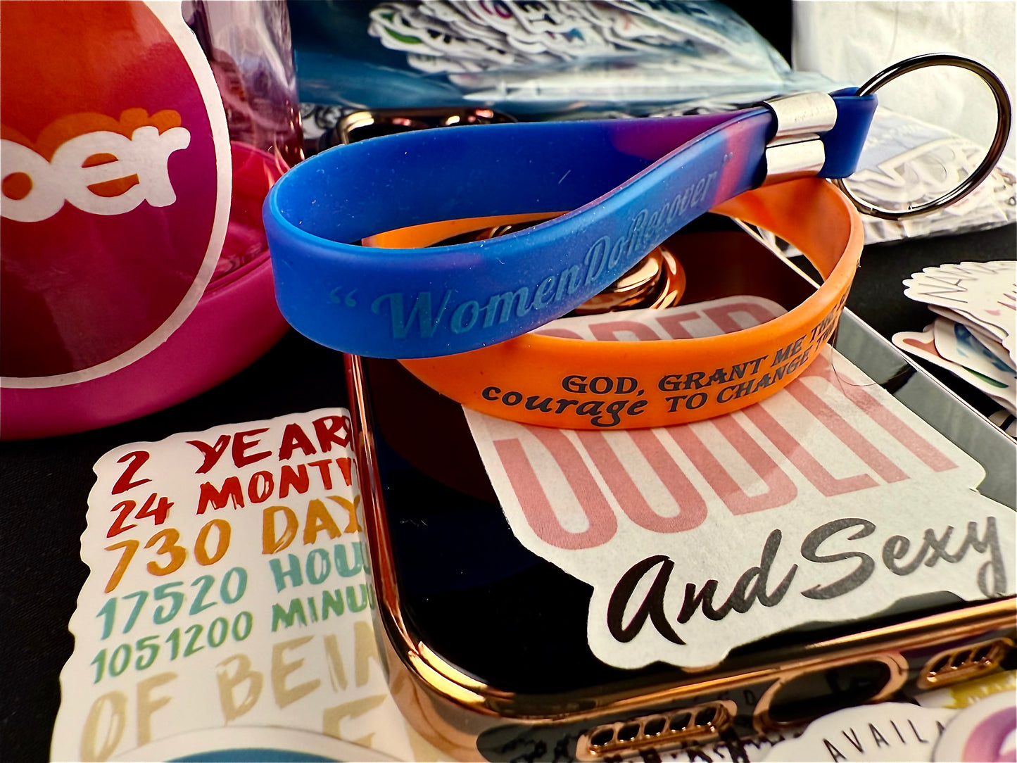 Twist of Orange “Serenity Prayer” Band for Her Including Reversible Women Do Recover Sober Princess Keychain and Recovery Based Motivational Quotes And Spirituality Phone and Water-Bottle Stickers.